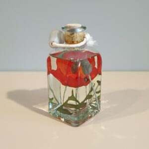 Blumenölflasche Mohn